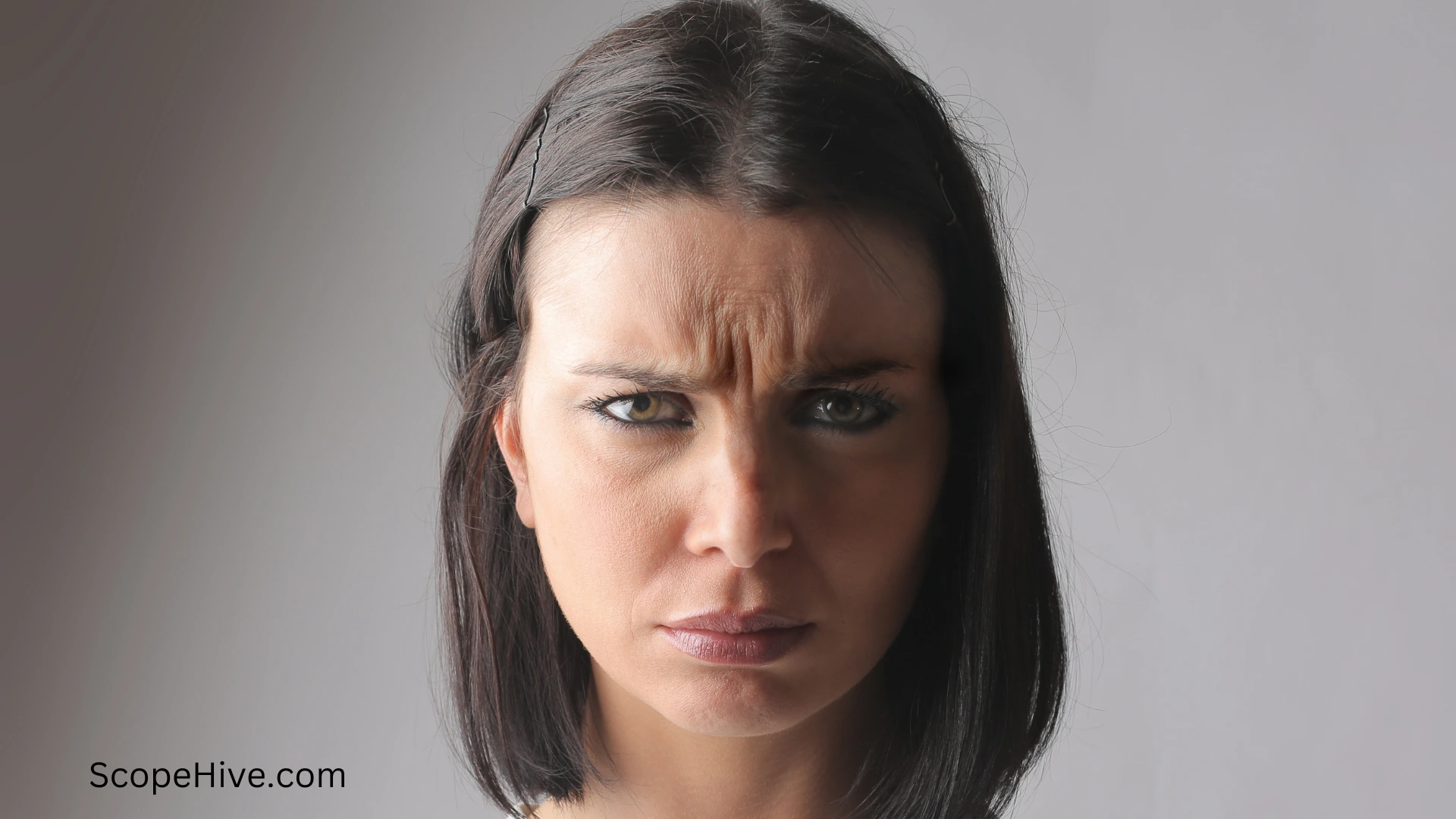 A women with Furrow Eyebrows